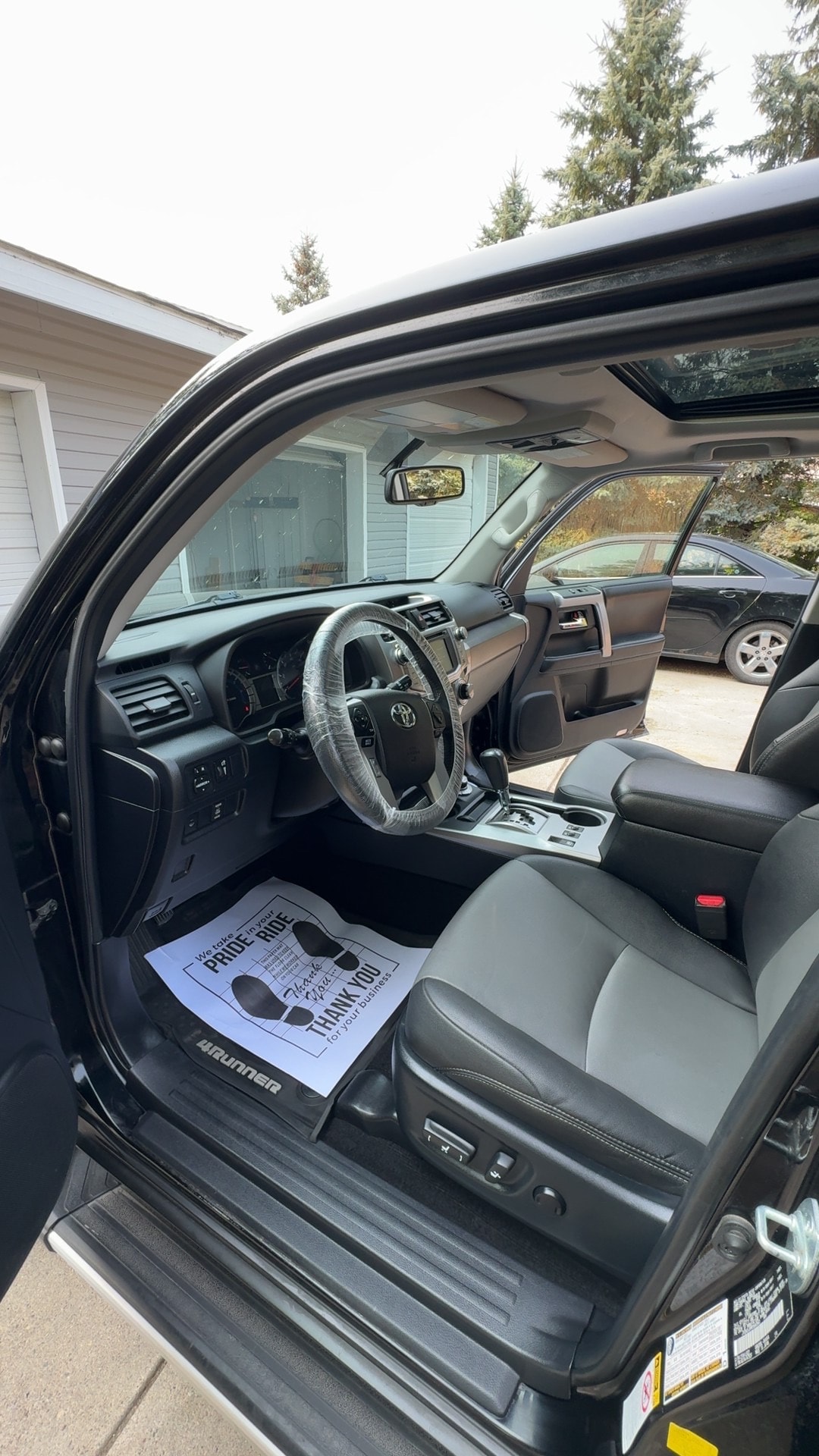 Interior detail — Toyota 4Runner black leather cabin